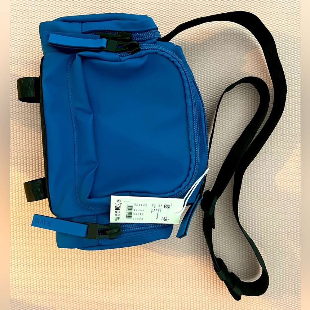 Rains Trail Crossbody Bag, Waves Blue. NWT Retail $155